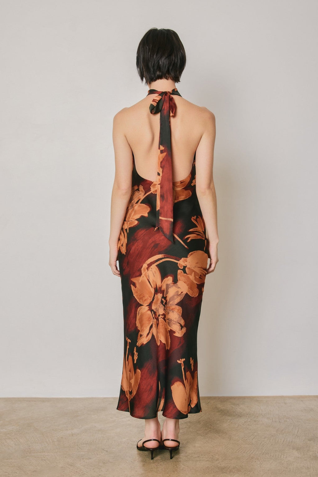 Waitlist 8/5 • Jeanette Sleeveless Halter Floral Print Midi Dress Black